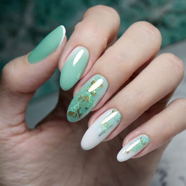 Firefly Nails in jade - green marble design with hand model 50376